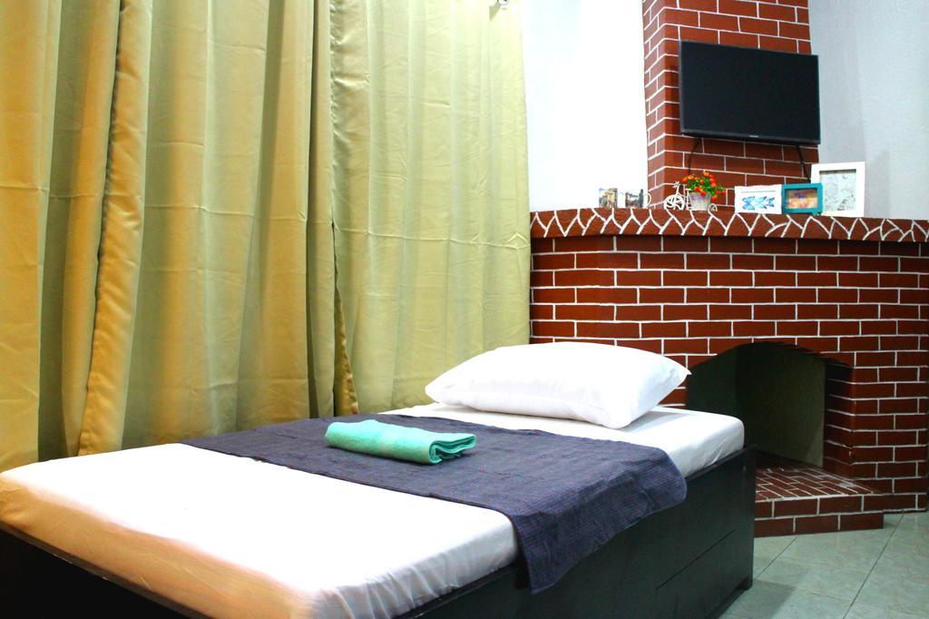 Tagaytay Garden Budgetel - City Center Tagaytay City Quarto foto